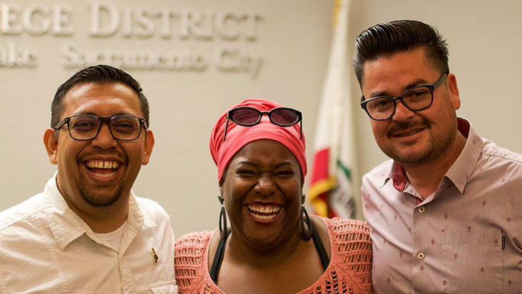 A group of smiling classified employees